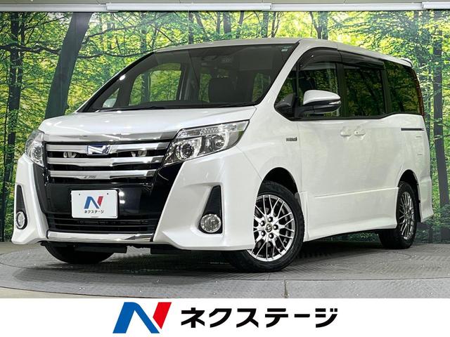 トヨタ ノア ハイブリッドＳｉ　禁煙車　純正１０型ナビ　後席モニター　ドラレコ　Ｂｌｕｅｔｏｏｔｈ再生　フルセグ　両側電動スライドドア　ＬＥＤヘッド　スマートキー　レーンアシスト　オートハイビーム　アイドリングストップ