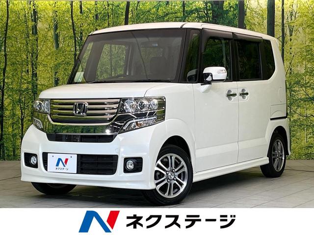 Ｎ－ＢＯＸ＋カスタム Ｇ・ターボパッケージ　ＳＤナビ　両側パワースライドドア　クルーズコントロール　バックカメラ　禁煙車　スマートキー　ＥＴＣ　パドルシフト　オートエアコン　オートライト　ＨＩＤヘッドライト　電動格納ミラー（1枚目）