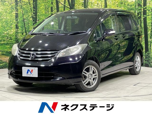 ホンダ フリード Ｇ　Ｌパッケージ　禁煙車　７人乗り　純正ナビ　フルセグ　ＤＶＤ／ＣＤ再生可　パーワースライドドア　ＥＴＣ　バックカメラ　オートエアコン　キーレス　１５インチアルミ　プライバシーガラス　ドアバイザー