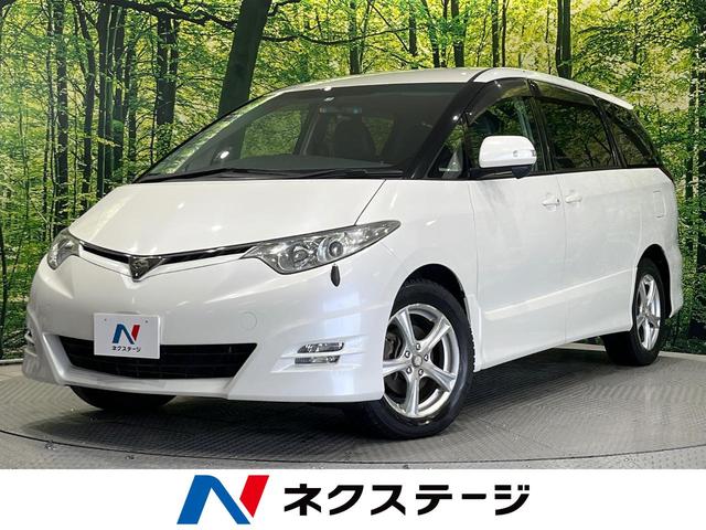 トヨタ エスティマ アエラス　禁煙車　４ＷＤ　電動スライドドア　純正ナビ　寒冷地仕様　８人乗り　革巻きステアリング　ＣＤ再生　ワンセグ　盗難防止装置　プライバシーガラス　オートライト　横滑り防止装置