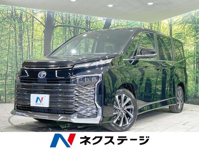 ヴォクシー(トヨタ) ハイブリッドＳ−Ｚ　登録済未使用車　衝突軽減装置　純正１０型ナビ　全周囲カメラ　レーダークルーズ　両側電動ドア 中古車画像