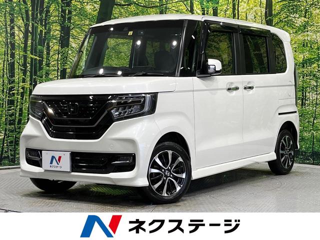 Ｎ－ＢＯＸカスタム Ｇ・Ｌホンダセンシング　４ＷＤ　８インチＳＤナビ　両側電動スライド　ホンダセンシング　禁煙車　アダプティブクルーズ　バックカメラ　ＥＴＣ　Ｂｌｕｅｔｏｏｔｈ　フルセグＴＶ　前席シートヒーター　シーケンシャルターンランプ（1枚目）