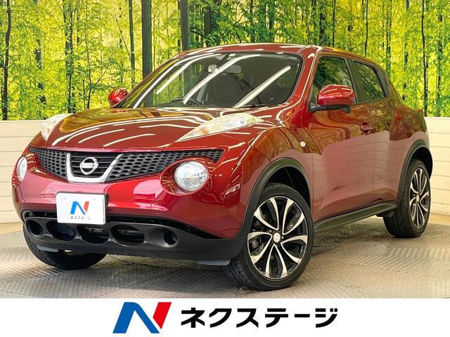 日産 ジューク １５ＲＸ　純正ナビ　バックカメラ　ＥＴＣ　インテリジェントキー　オートエアコン　オートライト　フロントフォグ　純正革巻きステアリング　電動格納ミラー　プライバシーガラス　ヘッドライトレベライザー　禁煙車