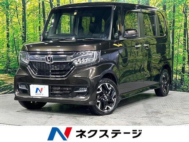 Ｎ－ＢＯＸカスタム Ｇ・Ｌターボホンダセンシング　４ＷＤ　純正８型ナビ　アダプティブクルーズ　シートヒーター　両側電動ドア　ＬＥＤヘッドライト　オートエアコン　ハーフレザーシート　ステアリングスイッチ　スマートキー（1枚目）