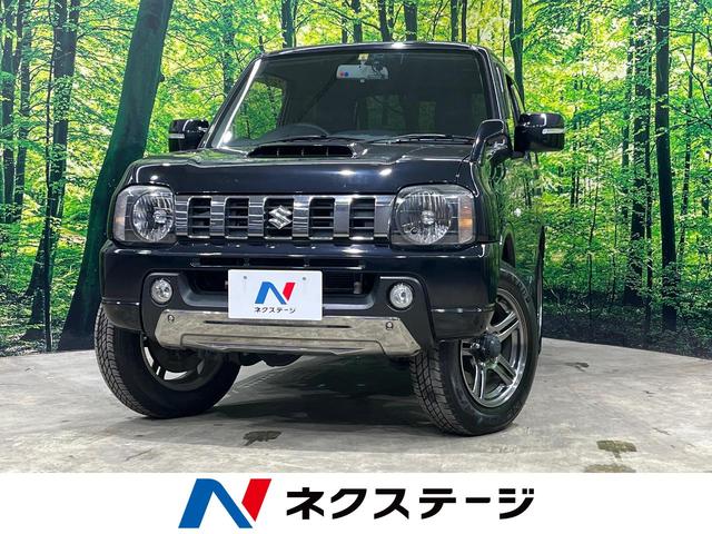 ジムニー ランドベンチャー　禁煙車　４ＷＤ　ＳＤナビ　フルセグＴＶ　ＣＤ／ＤＶＤ再生　バックカメラ　ＥＴＣ　運転席シートヒーター　電動格納ミラー　ＬＥＤヘッドライト　純正ＡＷ（1枚目）