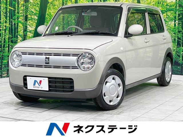 アルトラパン Ｇ　禁煙車　ＳＤナビ　衝突軽減　スマートキー　横滑り防止装置　前席アームレスト　ＣＤ再生　バニティミラー　プライバシーガラス　パワーウインドウ　ベンチシート（1枚目）