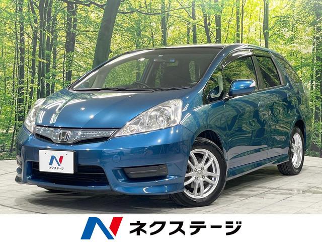 ハイブリッド・スマートセレクション　禁煙車　ＳＤナビ　寒冷地仕様　バックカメラ　ＥＴＣ　スマートキー　ＨＩＤヘッド　クルーズコントロール　オートライト　革巻きステアリング　オートエアコン　１５インチアルミホイール　ＣＤ再生　地デジ