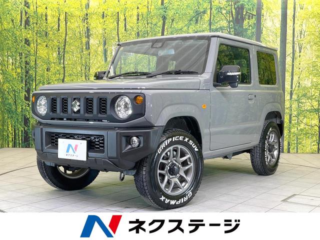 ジムニー ＸＣ　衝突軽減　４ＷＤ　クルコン　車線逸脱防止警報　クルコン　ステアリングスイッチ　ＬＥＤヘッド　純正１６インチアルミ　ヘッドライトウォッシャー　スマートキー　オートライト　バニティーミラー（1枚目）