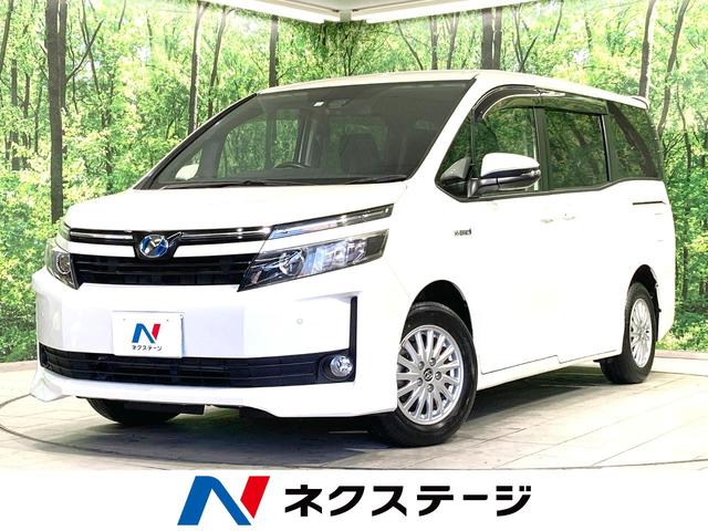 ヴォクシー(トヨタ) ハイブリッドＶ　禁煙車　純正９型ＳＤナビ　両側パワスラ　セーフティセンス　クルーズコントロール　ＬＥＤヘッドライト 中古車画像