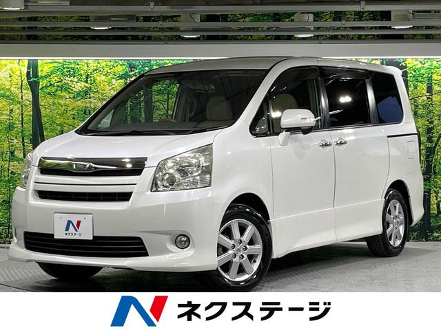 トヨタ ノア Ｓ　Ｇエディション　フリップダウンモニター　両側電動スライドドア　禁煙車　純正ナビ　ＥＴＣ　Ｂｌｕｅｔｏｏｔｈ　ドラレコ　ＨＩＤヘッドライト　スマートキー　ウッドコンビステアリング　純正１６インチＡＷ　フォグランプ