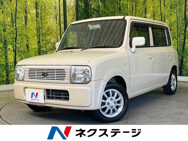 アルトラパン Ｘ　禁煙車　電動格納ドアミラー　純正アルミホイール　ドアバイザー　プライバシーガラス　盗難防止システム　アームレスト（1枚目）