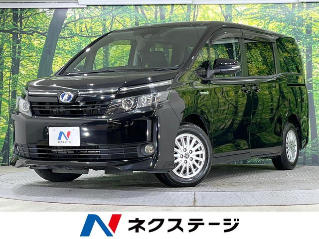 ヴォクシー(トヨタ) ハイブリッドＶ　禁煙車　両側電動スライドドア　衝突軽減装置　ナビ　バックカメラ　ＥＴＣ 中古車画像