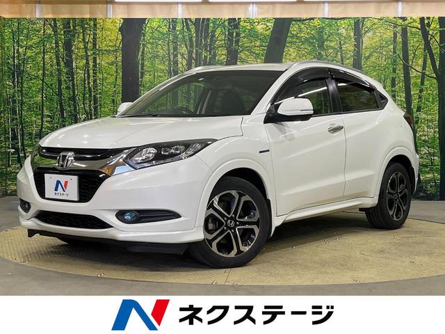 ホンダ ヴェゼル ハイブリッドＺ　シティブレーキアクティブシステム　ｃａｒｒｏｚｚｅｒｉａナビ　バックカメラ　シートヒーター　ＥＴＣ　Ｈｏｎｄａスマートキー　ＬＥＤヘッドライト　純正１７インチアルミホイール