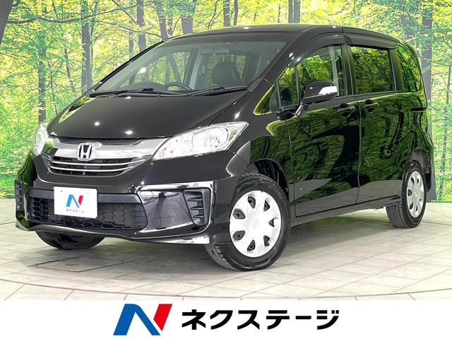 フリード(ホンダ) Ｇ　プレミアムエディション　４ＷＤ　両側パワースライド　純正ナビ　バックカメラ　ＥＴＣ 中古車画像