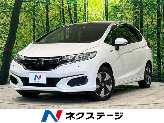 フィットハイブリッド(ホンダ) Ｆ　禁煙車　ホンダセンシング　アダプティブクルーズコントロール　ＳＤナビ　Ｂｌｕｅｔｏｏｔｈ再生　ＥＴＣ 中古車画像