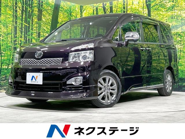 トヨタ ＺＳ　煌ＩＩ　禁煙車　モデリスタエアロ　後席モニター　両側電動スライド　純正ナビ　バックカメラ　ＥＴＣ　フルセグＴＶ　Ｂｌｕｅｔｏｏｔｈ再生　ＨＩＤヘッドライト　８人乗り　オートライト　１６インチＡＷ　フォグライト