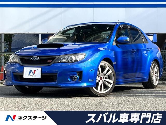 ＷＲＸ　ＳＴｉ　後期Ｄ型　６速ＭＴ　ターボ　大型リアスポイラー　ＳＤナビ　ＥＴＣ　ドライブレコーダー　禁煙車　ハーフレザーシート　パワーシート　ＨＩＤヘッドライト　純正１８インチアルミ