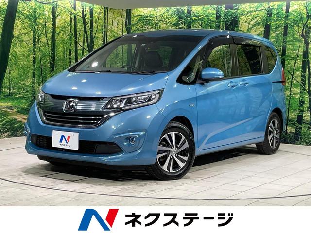 ホンダ フリードハイブリッド ハイブリッド・Ｇホンダセンシング　両側電動スライドドア　ホンダセンシング　禁煙車　レーダークルーズ　バックカメラ　ＥＴＣ　Ｂｌｕｅｔｏｏｔｈ　ディスプレイオーディオ　ＬＥＤヘッドライト　７人乗り　オートマチックハイビーム　盗難防止装置