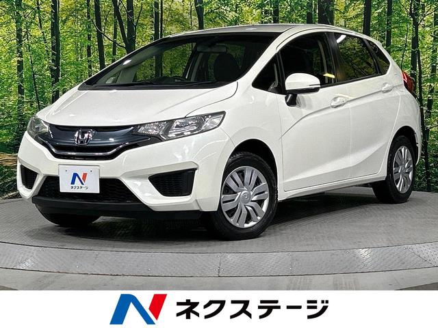 フィット(ホンダ) １３Ｇ・Ｆパッケージ　禁煙車　純正ナビ　寒冷地仕様　ＥＴＣ　オートエアコン　プライバシーガラス 中古車画像