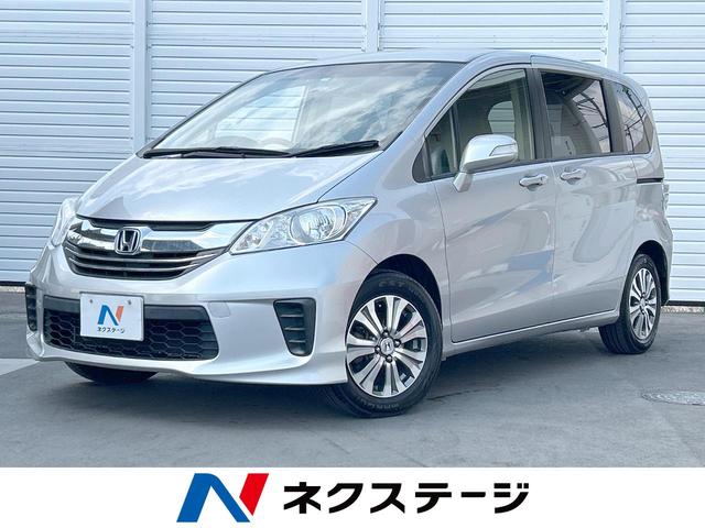 Ｇ　プレミアムエディション　フリップダウンモニター　両側電動スライドドア　純正ナビ　クルーズコントロール　バックカメラ　ＥＴＣ　ＨＩＤヘッドライト　オートエアコン　電動格納ミラー　横滑り防止装置　オートライト　Ｂｌｕｅｔｏｏｔｈ