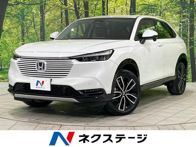 ｅ：ＨＥＶ　Ｚ　現行型　ホンダセンシング　アダプティブクルーズ　寒冷地仕様　純正ナビ　バックカメラ　ブラインドスポットモニター　Ｂｌｕｅｔｏｏｔｈ　パワーバックドア　ＥＴＣ２．０　シートヒーター　ハーフレザー