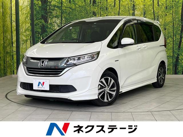 ハイブリッド・Ｇホンダセンシング　両側電動スライドドア　寒冷地仕様　衝突軽減装置　純正ナビ　レーダークルーズ　バックカメラ　Ｂｌｕｅｔｏｏｔｈ　フルセグＴＶ　ＥＴＣ　ＬＥＤヘッド　スマートキー　ドライブレコーダー　車線逸脱警報