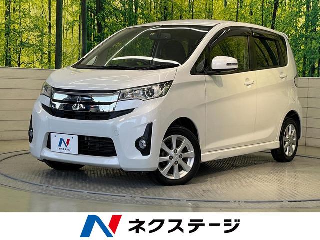 Ｇ　カーオーディオ　バックカメラ　オートエアコン　禁煙車　ＨＩＤヘッドライト　電動格納ミラー　スマートキー　ドアバイザー　盗難防止システム　シートアンダーボックス