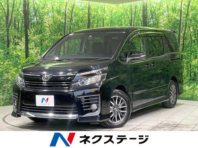 ＺＳ　純正９型ナビ　フリップダウンモニター　両側電動ドア　バックカメラ　Ｂｌｕｅｔｏｏｔｈ　ＬＥＤヘッド　純正１６インチアルミ　７人乗り　スマートキー　デュアルオートエアコン　ステアリングスイッチ　禁煙車