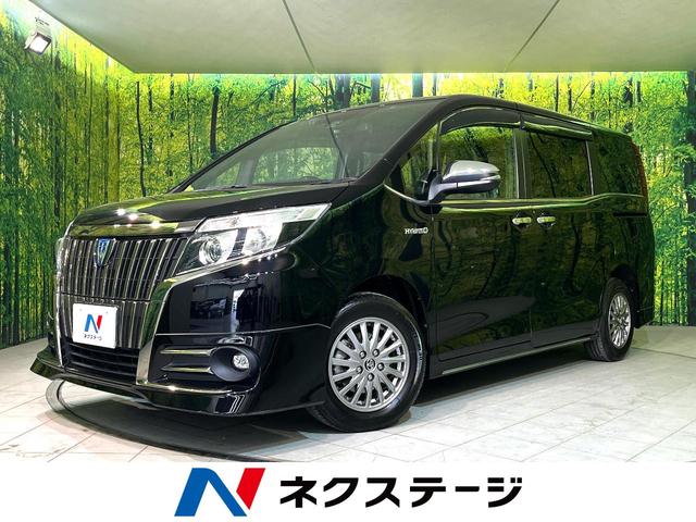 ハイブリッドＧｉ　ブラックテーラード　純正１０型ナビ　バックカメラ　後席モニター　衝突軽減　寒冷地仕様　両側電動スライド　クルコン　シートヒーター　Ｂｌｕｅｔｏｏｔｈ　ＥＴＣ　ＬＥＤヘッド＆フォグ　オートハイビーム　合皮コンビシート