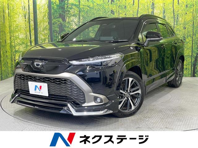 カローラクロス ハイブリッド　Ｚ　禁煙車　パノラマルーフ　ナビ機能付き１０．５型ディスプレイ　モデリスタフルエアロ　ＢＳＭ　１８インチＡＷ　ハーフレザーシート　パワーシート　シートヒーター　ＬＥＤヘッド　ハンズフリーパワーバックドア（1枚目）