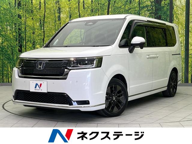 ｅ：ＨＥＶスパーダ　フリップダウンモニター　両側電動スライドドア　純正９型ナビ　禁煙車　ホンダセンシング　レーダークルーズ　パワーバッグドア　ＥＴＣ　Ｂｌｕｅｔｏｏｔｈ　フルセグ　リアオートエアコン　ＬＥＤヘッド