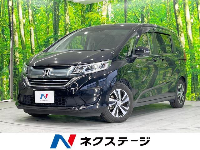 ハイブリッド・Ｇホンダセンシング　純正ナビ　バックカメラ　衝突被害軽減システム　禁煙車　両側電動スライドドア　レーダークルーズコントロール　ドラレコ　ＥＴＣ　Ｂｌｕｅｔｏｏｔｈ　フルセグ　ハーフレザーシート　ＬＥＤヘッドライト