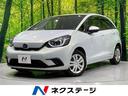 フィット ｅ：ＨＥＶホーム　禁煙車　純正９型ナビ　ホンダセンシング　アダプティブクルーズコントロール　ＬＥＤヘッドライト　バックカメラ　オートエアコン　ＥＴＣ　ドライブレコーダー　Ｂｌｕｅｔｏｏｔｈ　パーキングセンサーシステム（1枚目）