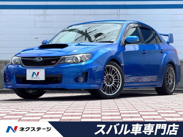 ＷＲＸ　ＳＴＩ　Ａライン　禁煙車　ＳＴＩマフラー　茶革シート　純正オプションＢＢＳ製１８インチアルミ　ＳＴＩタワーバー　純正パナソニックナビ　ＥＴＣ　前席シートヒーター　前席パワーシート　大型リアスポイラー　純正革巻きハンドル