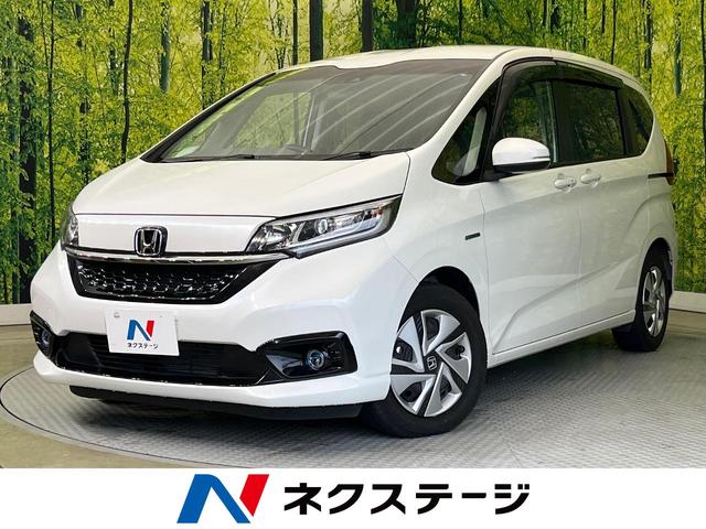 ハイブリッド・Ｇホンダセンシング　両側電動スライド　純正ナビ　バックカメラ　ホンダセンシング　アダプティブクルーズ　禁煙車　シートヒーター　ドラレコ　スマートキー　ＬＥＤヘッド　ＥＴＣ　オートマチックハイビーム　車線逸脱警報