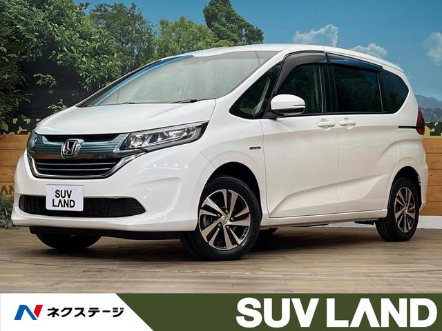 ハイブリッド・Ｇホンダセンシング　４ＷＤ　純正ナビ　ホンダセンシング　バックカメラ　両側電動スライドドア　ＥＴＣ　レーダークルーズコントロール　前席シートヒーター　ＬＥＤヘッドライト　革巻きステアリング