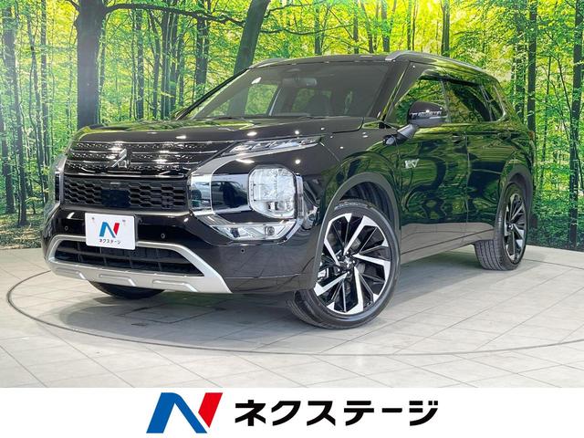 アウトランダーＰＨＥＶ(三菱) Ｐ　４ＷＤ　７人乗り　サンルーフ　純正ナビ　衝突軽減　全周囲カメラ 中古車画像