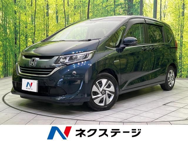 フリードハイブリッド(ホンダ) ハイブリッド・Ｇホンダセンシング　禁煙車　寒冷地仕様　衝突軽減装置システム　純正ナビ　バックカメラ　両側電動スライドドア 中古車画像