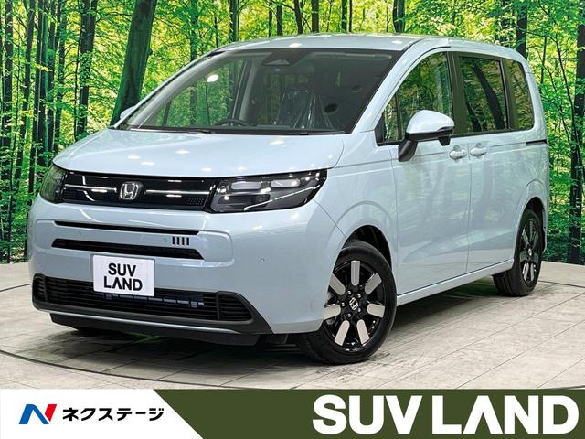 フリード(ホンダ) エアー　ＥＸ　登録済未使用車　両側電動ドア　衝突軽減　レーダークルーズ　ハーフレザーシート　コーナーセンサー　スマートキー　ＬＥＤヘッド　オートハイビーム　車線逸脱警報　オートライト　オートエアコン 中古車画像