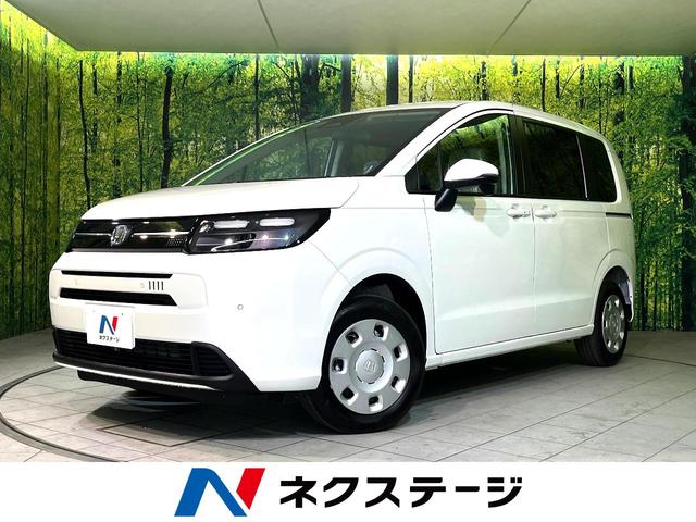 フリード(ホンダ) エアー　４ＷＤ　登録済未使用車　衝突軽減　純正ナビ　両側電動スライドドア　シートヒーター　ＬＥＤヘッドライト　Ｂｌｕｅｔｏｏｔｈ接続　オートエアコン　スマートキー　横滑り防止装置　盗難防止 中古車画像