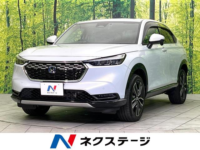 ヴェゼル(ホンダ) ｅ：ＨＥＶ　Ｚ　４ＷＤ　禁煙車　純正９型ＤＡ　Ｂｌｕｅｔｏｏｔｈ再生　バックカメラ　電動リアゲート　ハーフレザーシート　ドラレコ　コーナーセンサー　スマートキー　ＬＥＤヘッド　ＥＴＣ　クルコン　オートライト 中古車画像