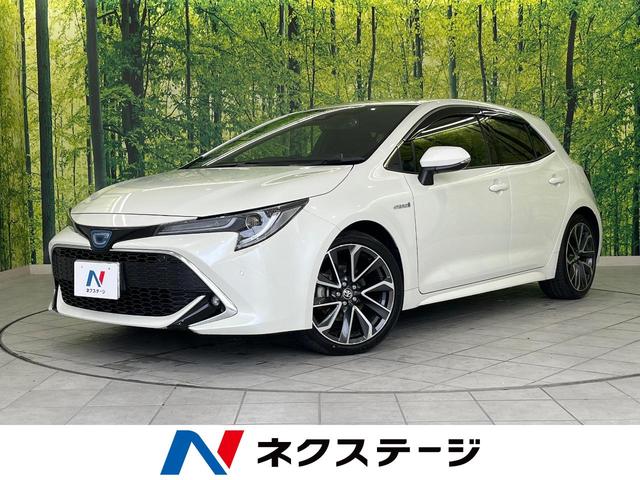 カローラスポーツ(トヨタ) ハイブリッドＧ　Ｚ　純正９型ナビ　バックカメラ　Ｂｌｕｅｔｏｏｔｈ接続　衝突被害軽減システム　レーダークルーズ　禁煙車　ドラレコ　コーナーセンサー　スマートキー　ＬＥＤヘッド　ＥＴＣ　オートハイビーム　車線逸脱警報 中古車画像
