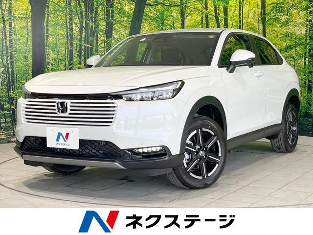 ヴェゼル Ｇ　登録済未使用車　４ＷＤ　寒冷地仕様　ホンダセンシング　アダプティブクルーズ　オートエアコン　スマートキー　オートライト　ＬＥＤヘッド　革巻きステアリング　電動格納ミラー　パワーウィンドウ（1枚目）