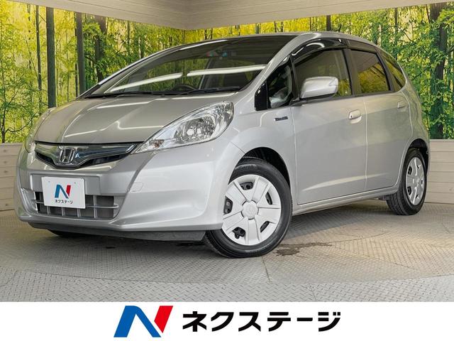 フィットハイブリッド　栃木県 ＳＤナビ　禁煙車　クルーズコントロール　オートライト　ＨＩＤヘッドライト