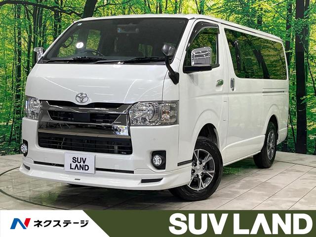 ハイエースバン スーパーＧＬ　ダークプライムＩＩ　禁煙車　モデリスタエアロ　純正ナビ　全周囲カメラ　デジタルインナーミラー　衝突軽減　クリアランスソナー　レーンアシスト　両側スライドドア　ＬＥＤヘッド　純正１５インチＡＷ　ハーフレザーシート　ＥＴＣ（1枚目）