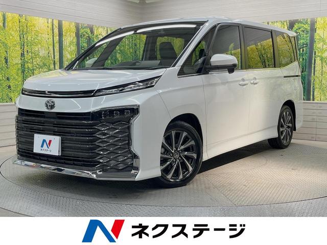 ヴォクシー Ｓ－Ｚ　ナビ機能付き１０型ディスプレイオーディオ　レーダークルーズコントロール　禁煙車　両側電動スライドドア　バックカメラ　ＬＥＤヘッドライト　前席シートヒーター　Ｂｌｕｅｔｏｏｔｈ接続　クリアランスソナー（1枚目）