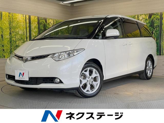 エスティマ Ｇ　７人乗り　両側パワスラ　純正ＨＤＤナビ　後席モニター　バックカメラ　禁煙車　パワーシート　ドラレコ　スマートキー　ＨＩＤヘッド　ＥＴＣ　クルコン　オートライト　デュアルエアコン　純正１７インチアルミ（1枚目）