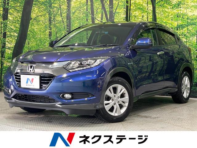 ヴェゼル ハイブリッドＸ・ホンダセンシング　ＳＤナビ　フルセグ　バックカメラ　ホンダセンシング　アダプティブクルーズ　ＬＥＤヘッドライト　オートライト　スマートキー　革巻きハンドル　パドルシフト　オートエアコン　電動ミラー　禁煙車　ＥＴＣ（1枚目）