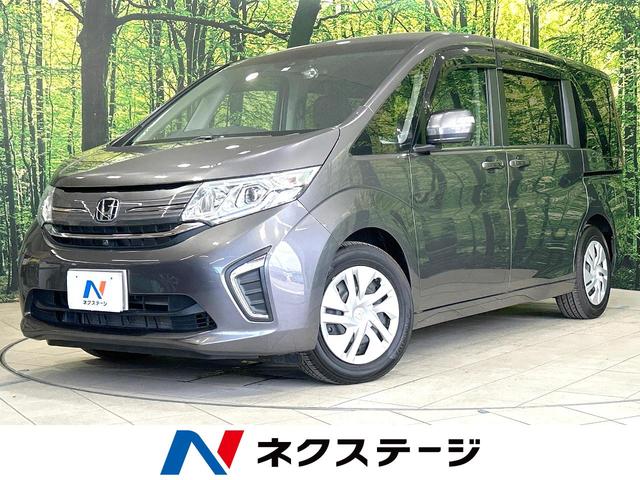 ステップワゴン(ホンダ) Ｇ　ホンダセンシング　ターボ　両側電動ドア　後席モニター　全周囲カメラ　衝突被害軽減システム　レーダークルーズ　禁煙車　ドラレコ　スマートキー　ＬＥＤヘッド　ビルトインＥＴＣ　車線逸脱警報　オートライト　デュアルエアコン 中古車画像