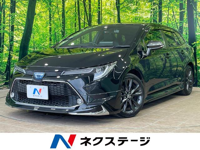 沖縄県の中古車ならカローラツーリング ハイブリッド　ダブルバイビー　１年保証付　バックカメラ　衝突被害軽減システム　レーダークルーズ　禁煙車　前席シートエアコン　ドラレコ　コーナーセンサー　スマートキー　ＬＥＤヘッド　ビルトインＥＴＣ　オートハイビーム　車線逸脱警報